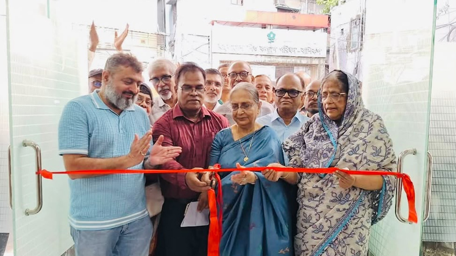 Guests cut the ribbon to inaugurate the new building.